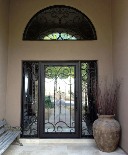 Elegant wrought iron double doors with intricate designs and frosted glass panels.