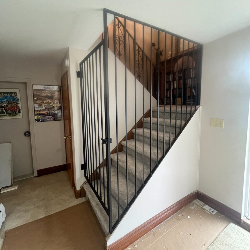 Security gates for residential rental unit. Residential gate contractor, metal gates separating two rental units.