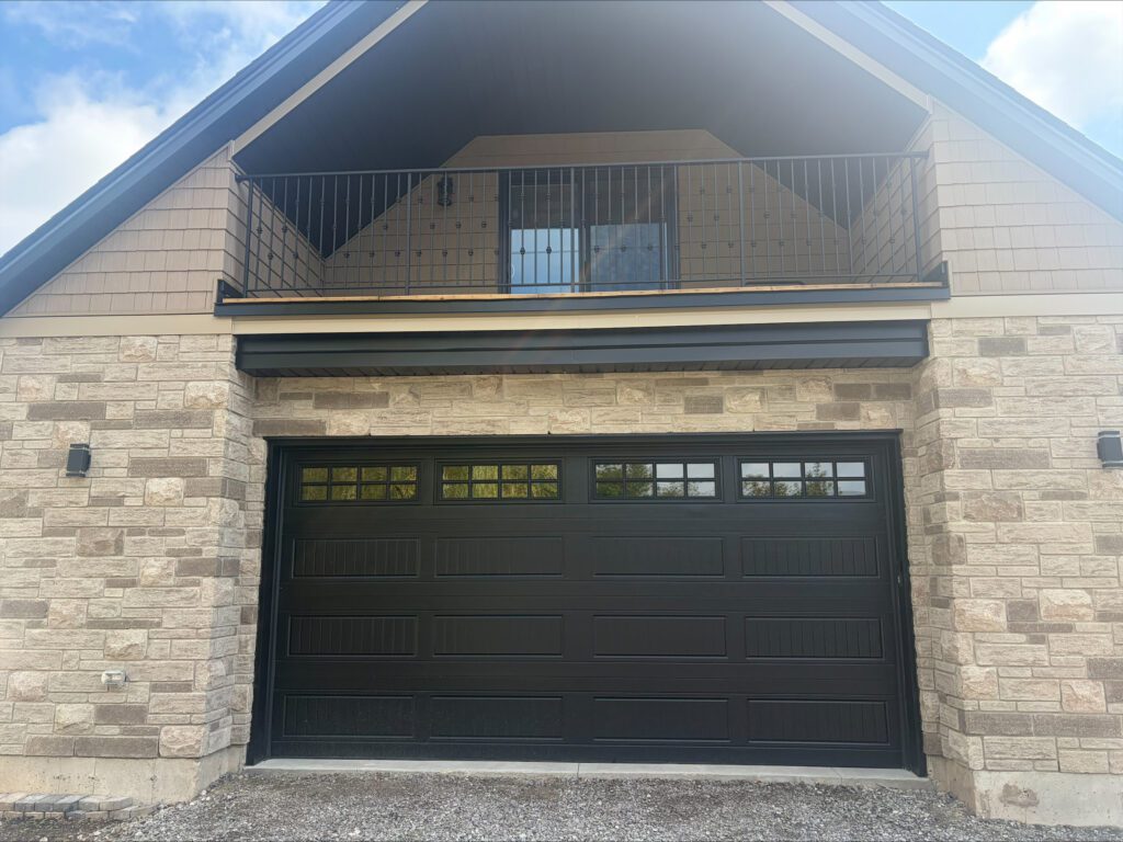 Wrought Iron Juliet Balcony Railing on a barn second level patio area.