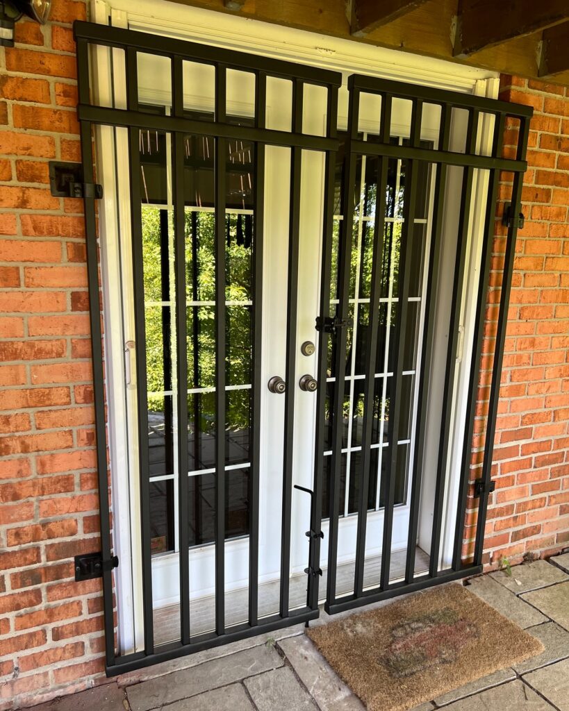 Custom fabricated iron security doors with lockable key entry by Dream Ironwork, featuring durable welded construction, precision craftsmanship, and a modern secure design for enhanced residential protection.