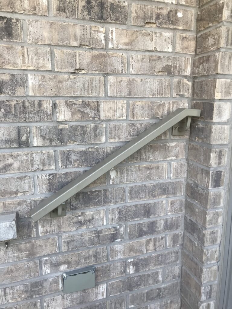 Powder coated exterior wall mounted railing
